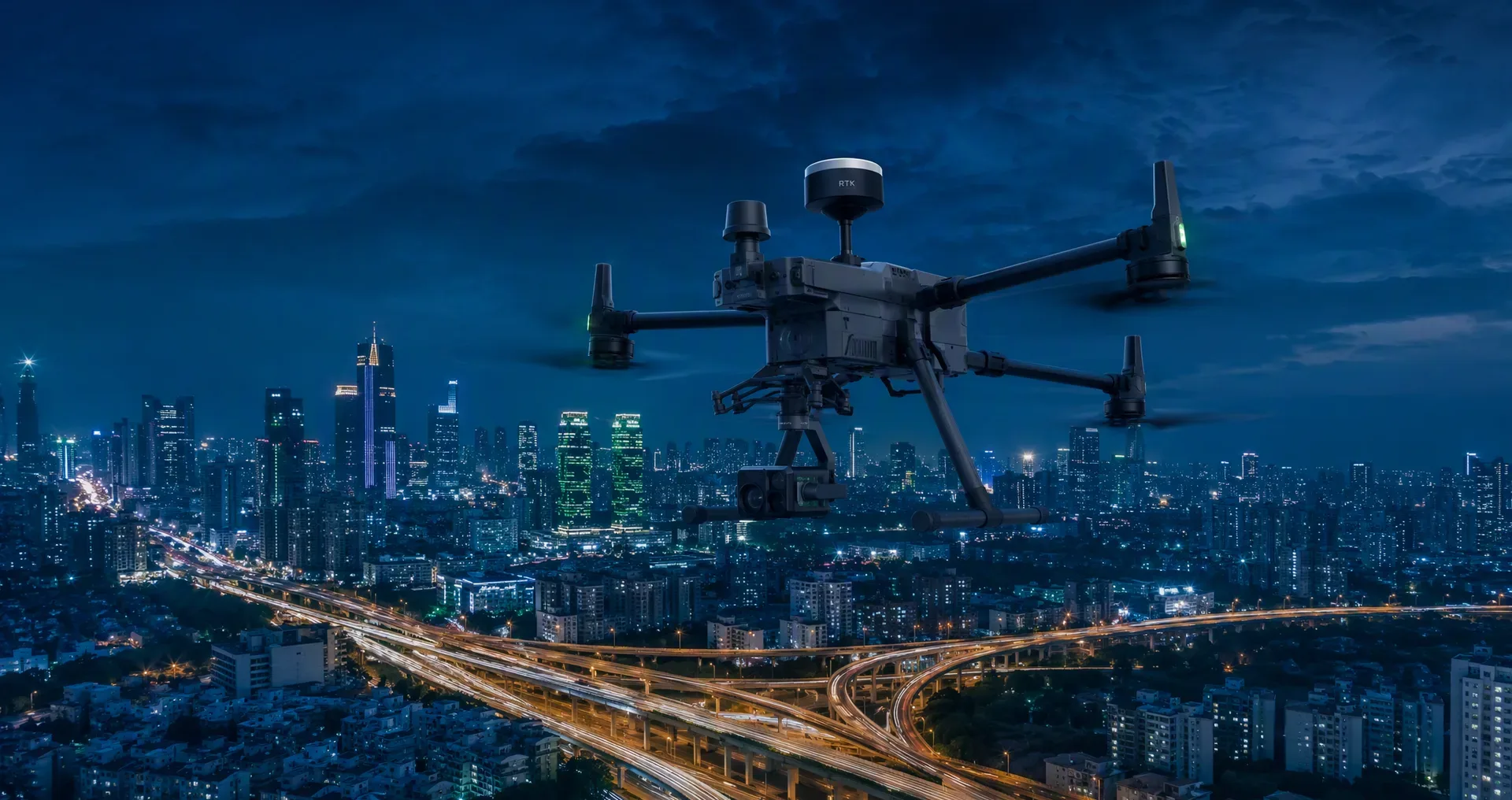 Enterprise RTK drone flying over illuminated city infrastructure at dusk